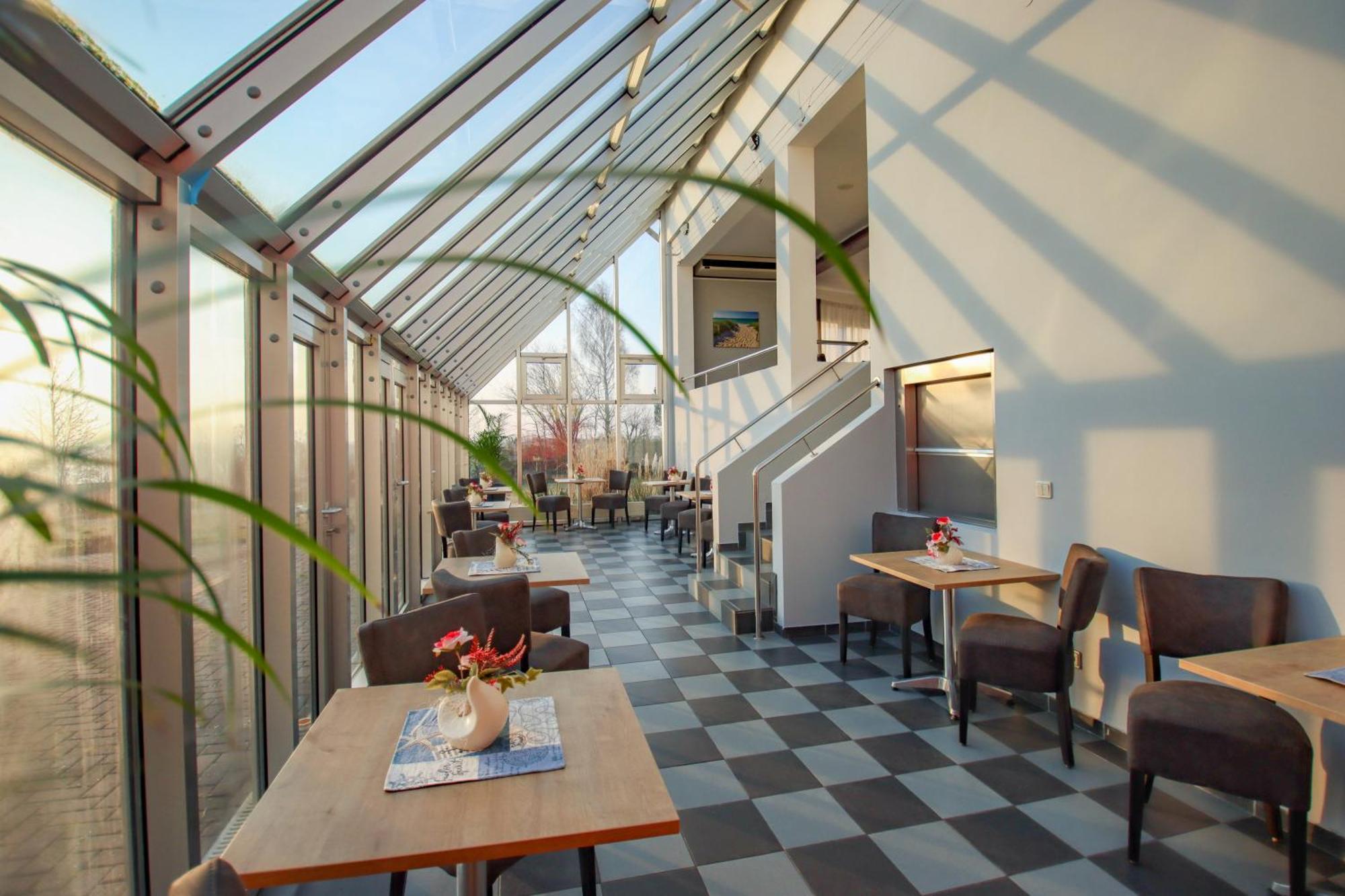 Inselhotel Kleiner Bodden Buschvitz Esterno foto